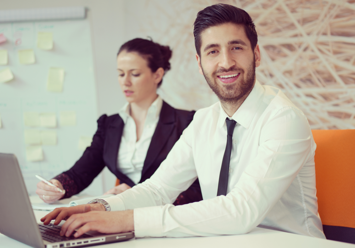 Man and woman working in an office in Turkmenistan