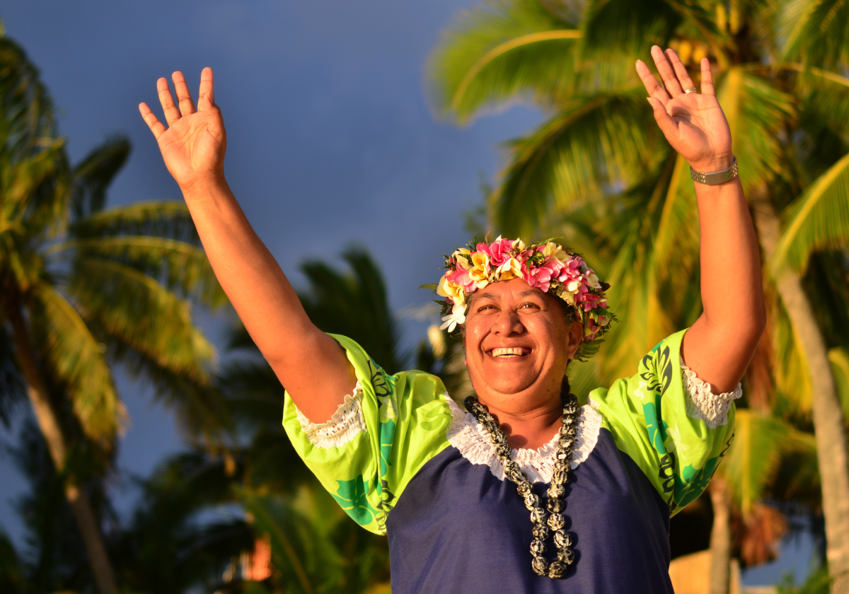 Woman wearing traditional clothing dancing in Samoa