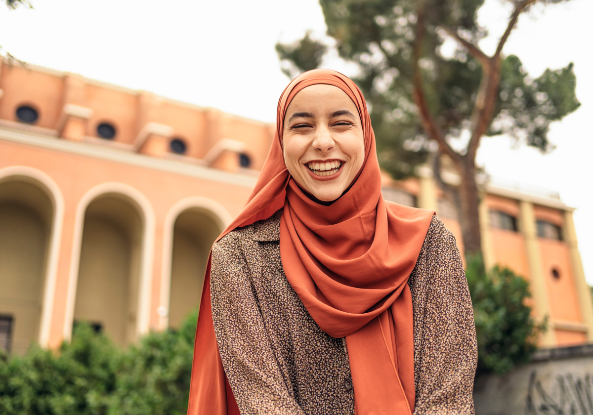 Photo of a woman smiling in a town in Jordan