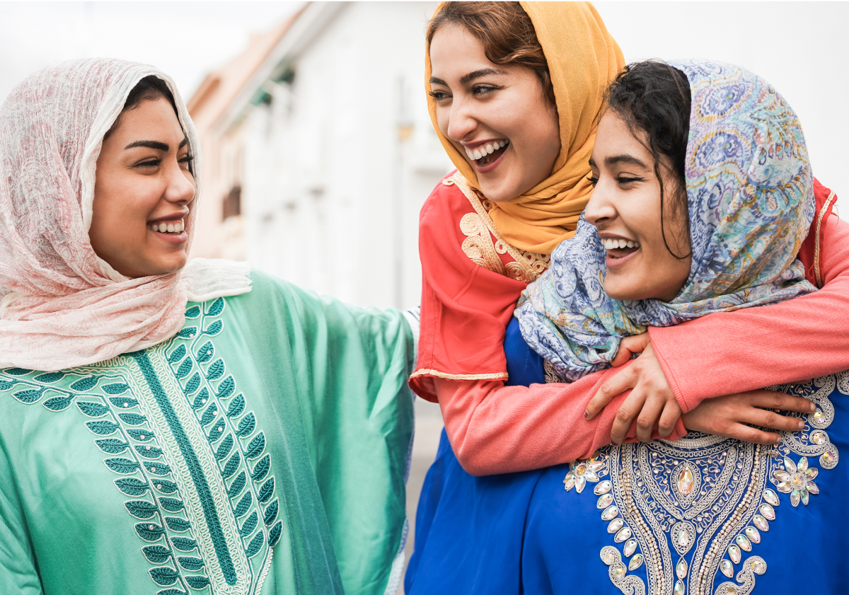 Photo of three women in Tunisia wearing traditional clothing
