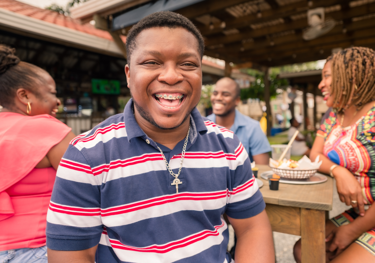 Man at lunch with friends in Saint Martin