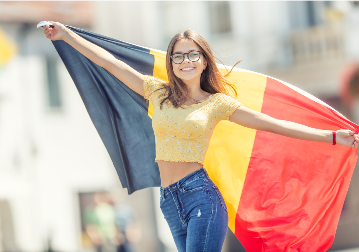 Photo of woman holding a flag in Belgium