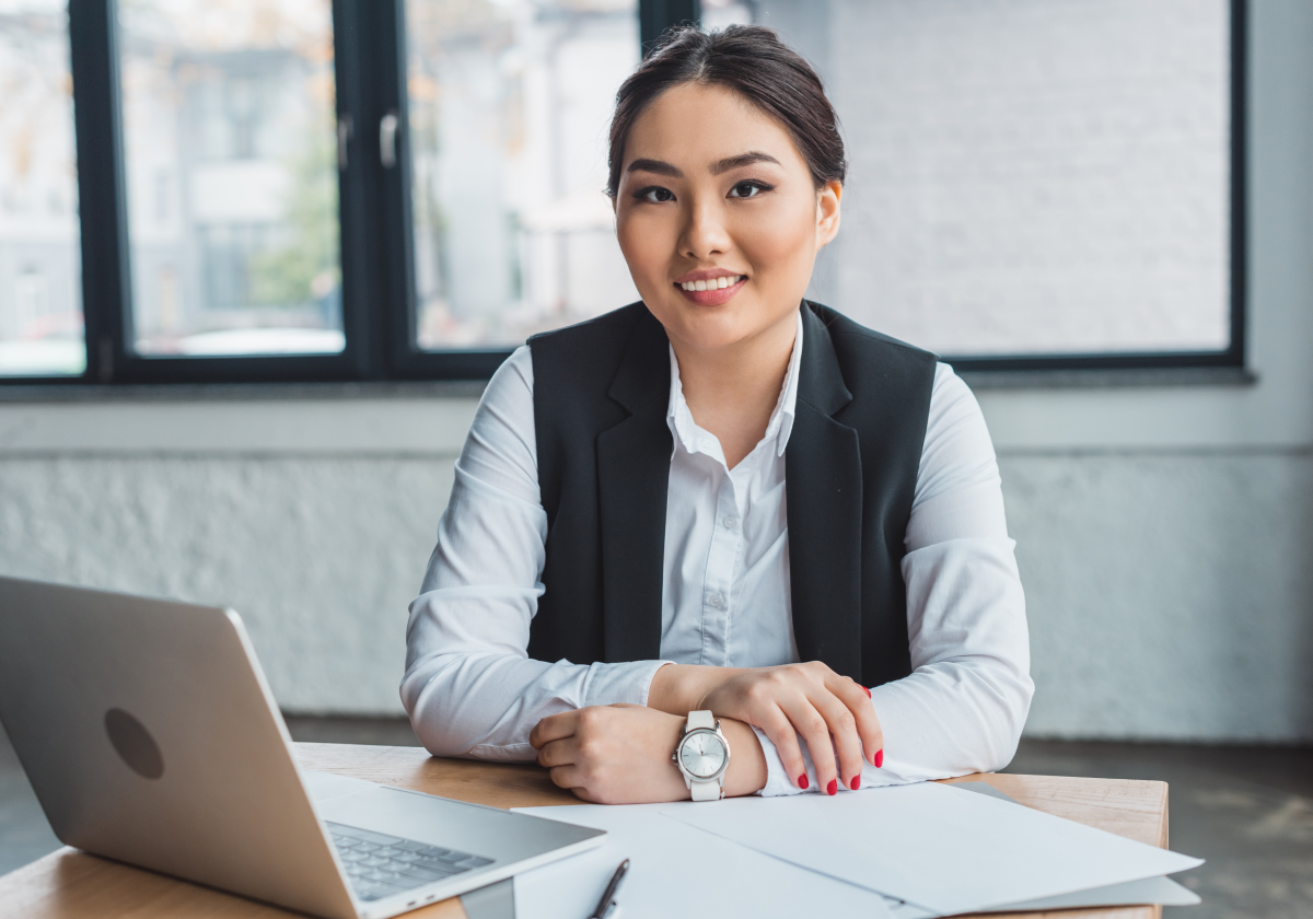 Woman smiling in an office building in Kazakhstan