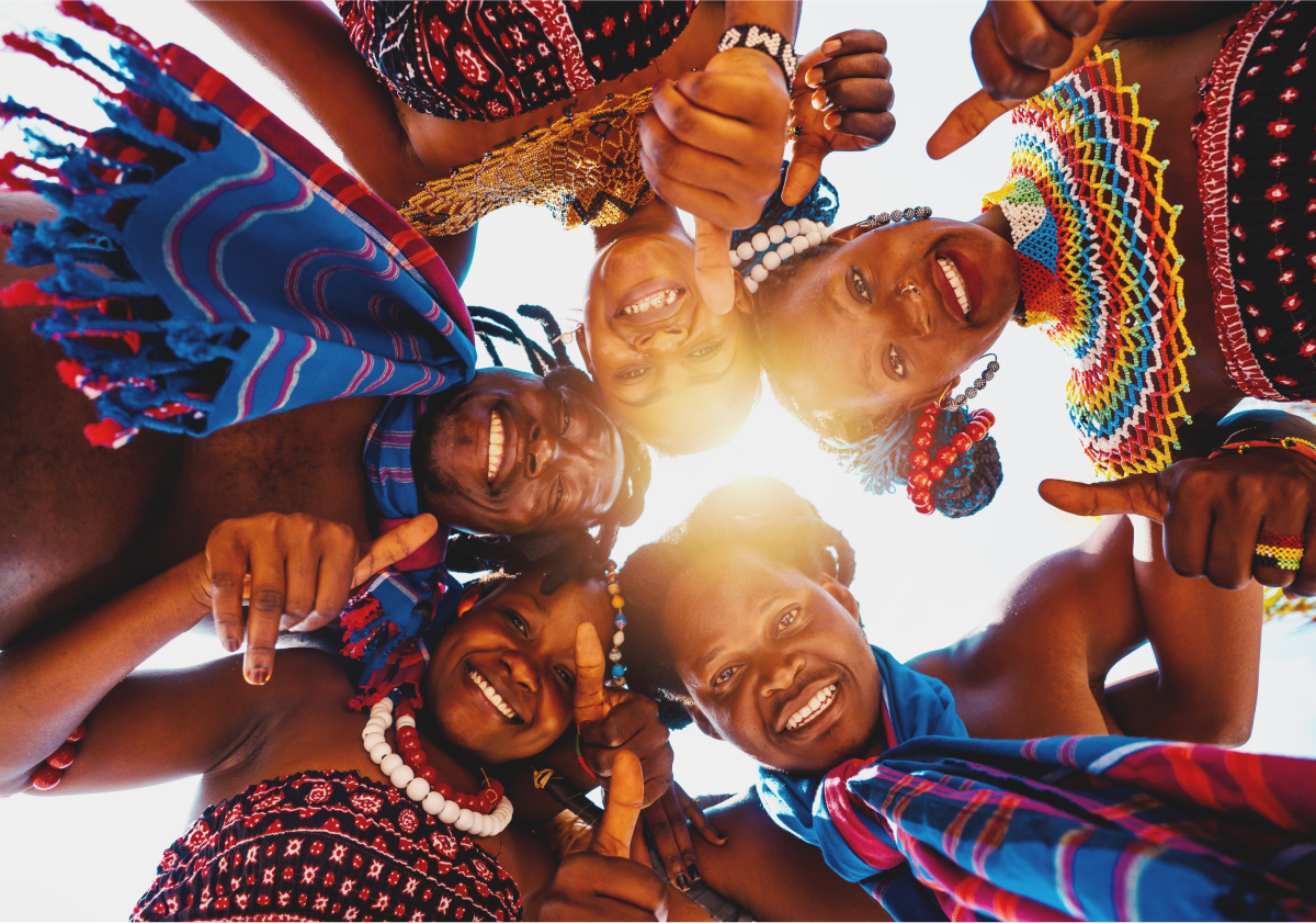 Photo of friends posing in a circle in Kenya