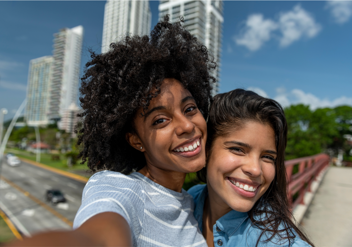 Photo of friends taking a selfie in a city in Panama