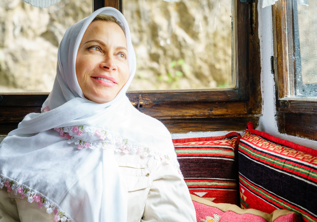 Woman smiling while wearing traditional clothing in Bosnia And Herzegovina