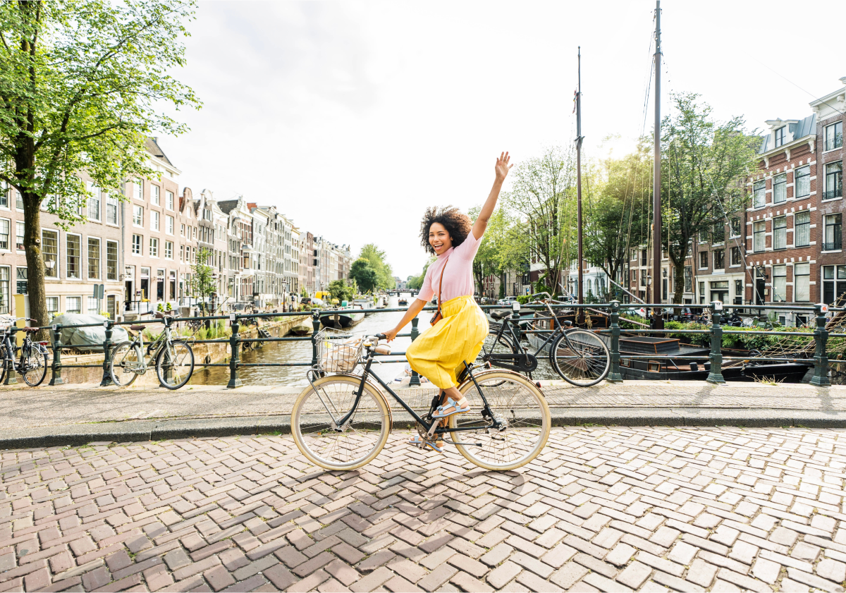 Photo of woman riding a bike in the Netherlands