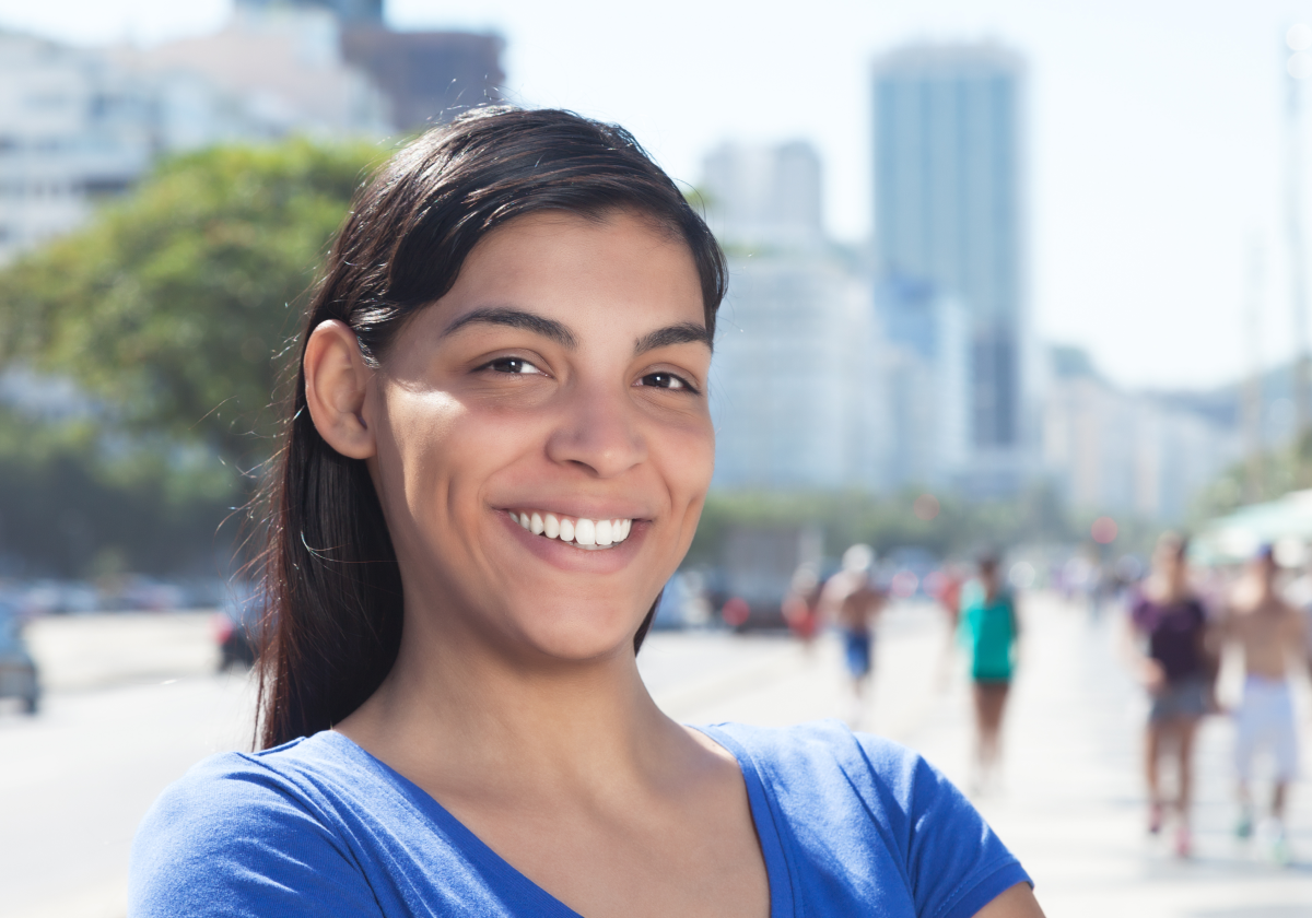 Woman smiling on a street in Paraguay