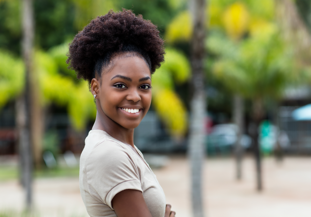Woman smiling in a park in Grenada