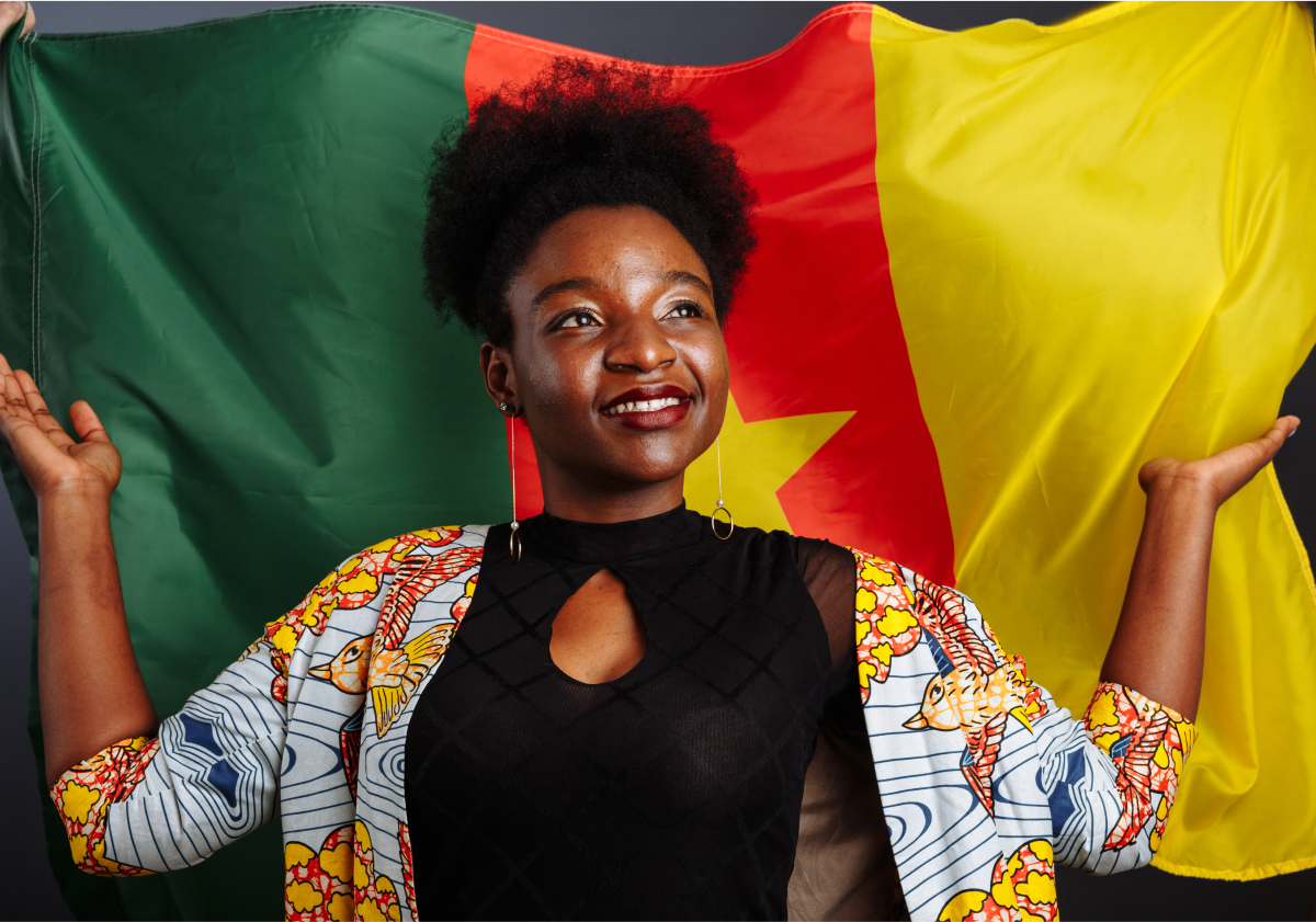 Photo of woman holding a flag in Cameroon