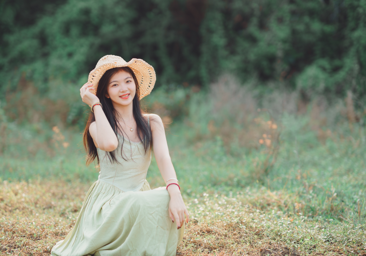 Woman smiling in a field in the Reunion Islands