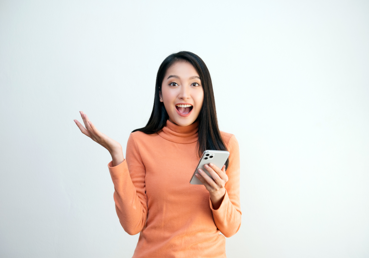 Woman using mobile phone in Myanmar